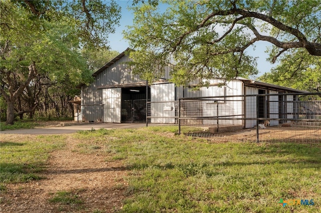 1910 S Rainbow Ranch Rd, Wimberley, TX 78676 - view of outdoor structure with an outdoor structure and fence