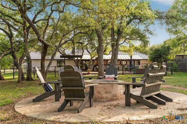1910 S Rainbow Ranch Rd, Wimberley, TX 78676 - view of yard with an outdoor fire pit and fence