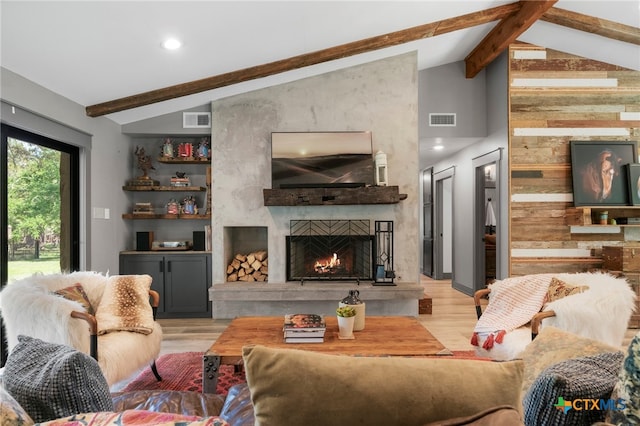 1910 S Rainbow Ranch Rd, Wimberley, TX 78676 - living area with light wood-style floors and a large fireplace