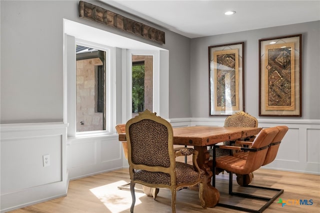 1910 S Rainbow Ranch Rd, Wimberley, TX 78676 - dining room with a decorative wall, light wood-type flooring, wainscoting, and recessed lighting