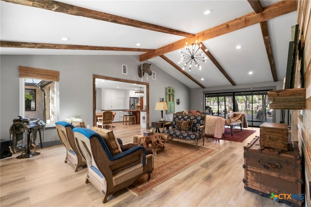 1910 S Rainbow Ranch Rd, Wimberley, TX 78676 - living room with light wood-style floors, a chandelier, and recessed lighting