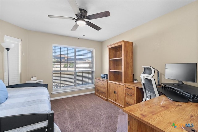 bedroom featuring a ceiling fan and dark colored carpet