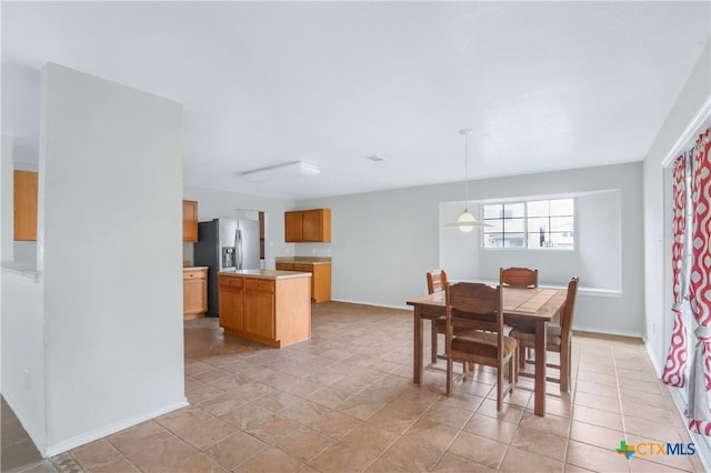 view of tiled dining space