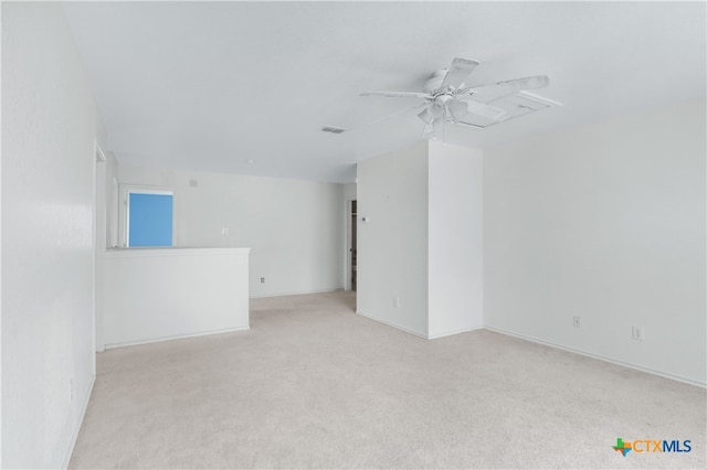 carpeted empty room with ceiling fan