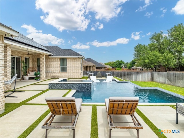 view of pool with a fenced in pool, a fenced backyard, and a patio