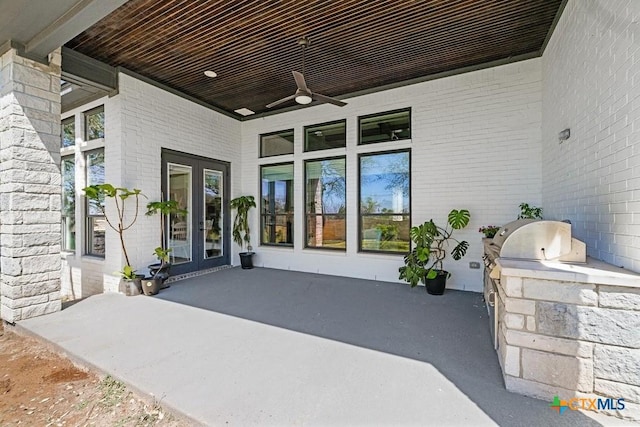 1745 Alta Vista Loop, Temple, TX 76502 - view of patio featuring exterior kitchen, french doors, and ceiling fan