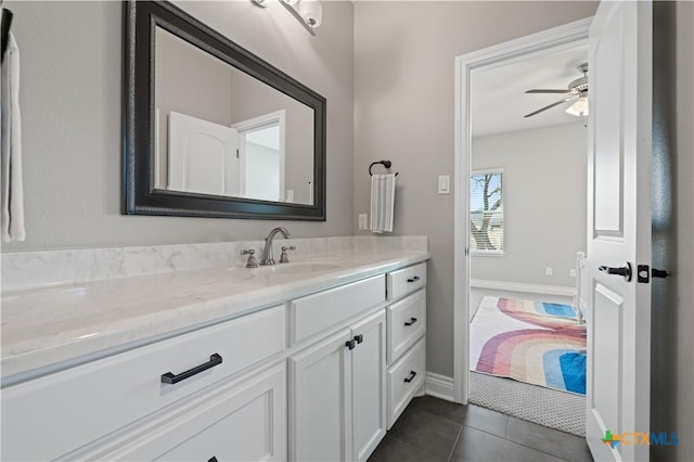 1745 Alta Vista Loop, Temple, TX 76502 - bathroom with baseboards, ceiling fan, tile patterned flooring, and vanity