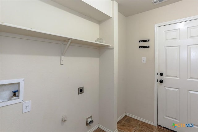 washroom featuring hookup for a washing machine, visible vents, electric dryer hookup, laundry area, and baseboards