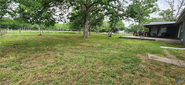 view of yard featuring a deck