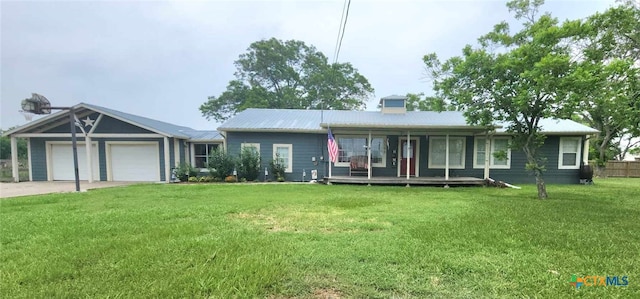 ranch-style house with a front yard and a garage