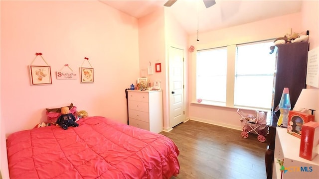 bedroom with wood-type flooring and ceiling fan