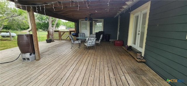 wooden terrace with ceiling fan