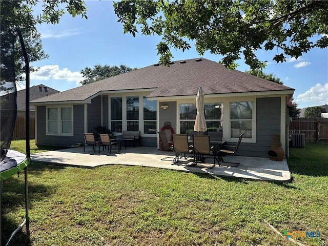 101 Arabian Dr, Victoria, TX 77904 - rear view of house with a patio and roof with shingles