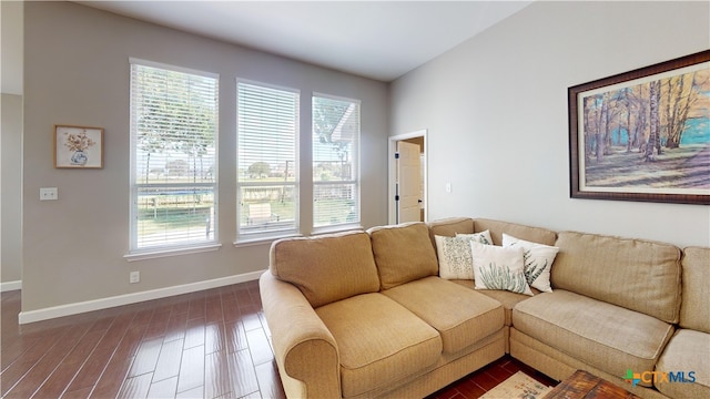 101 Arabian Dr, Victoria, TX 77904 - living area with baseboards and dark wood-style floors