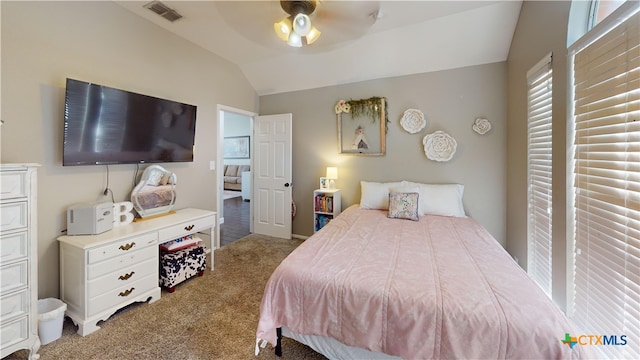 101 Arabian Dr, Victoria, TX 77904 - carpeted bedroom featuring vaulted ceiling and a ceiling fan