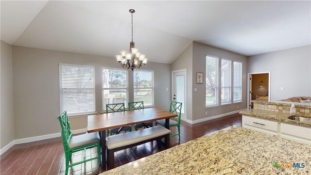 101 Arabian Dr, Victoria, TX 77904 - dining area featuring a chandelier, dark wood finished floors, and lofted ceiling