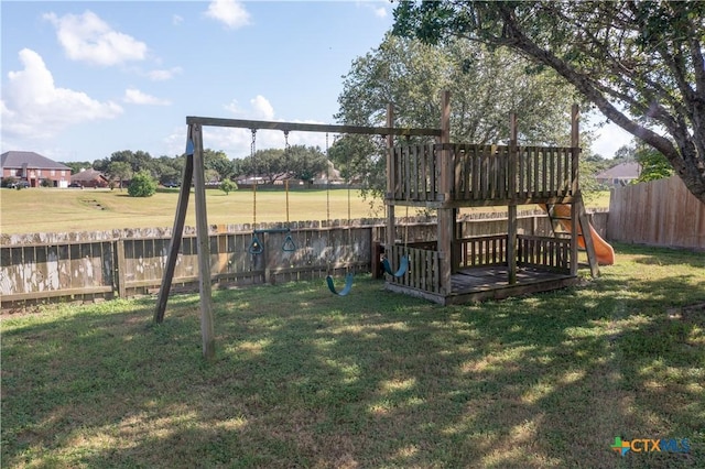 101 Arabian Dr, Victoria, TX 77904 - fenced backyard with a playground