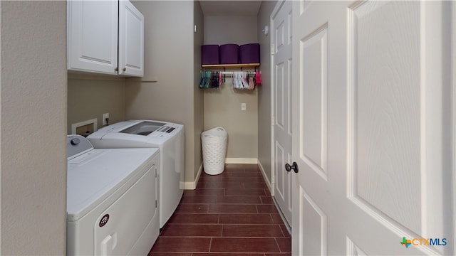 101 Arabian Dr, Victoria, TX 77904 - washroom featuring cabinet space and washing machine and clothes dryer