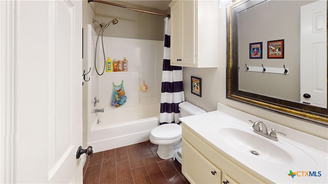 101 Arabian Dr, Victoria, TX 77904 - full bathroom with vanity, shower / bath combo, and wood finished floors