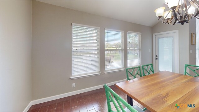 101 Arabian Dr, Victoria, TX 77904 - dining room with a chandelier, dark wood-type flooring, and lofted ceiling