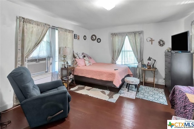 1005 Macarthur St, Victoria, TX 77901 - bedroom featuring wood finished floors and cooling unit