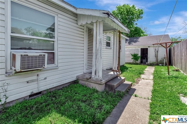 1005 Macarthur St, Victoria, TX 77901 - view of yard with fence, an outbuilding, and cooling unit