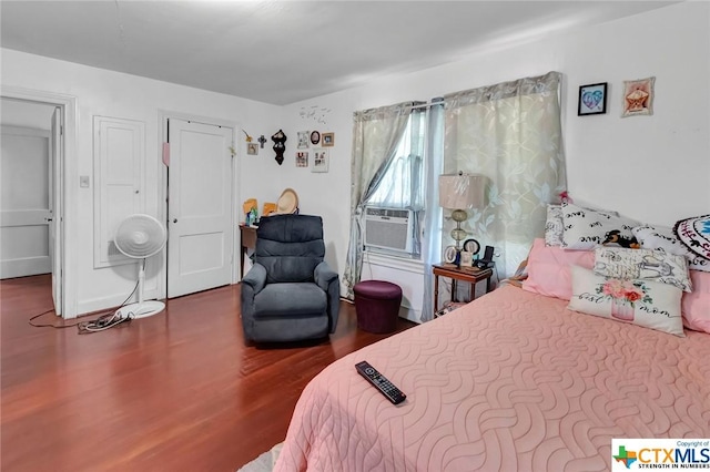1005 Macarthur St, Victoria, TX 77901 - bedroom featuring wood finished floors and cooling unit