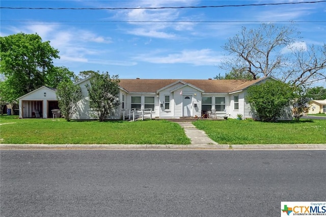 1005 Macarthur St, Victoria, TX 77901 - ranch-style house featuring a front yard