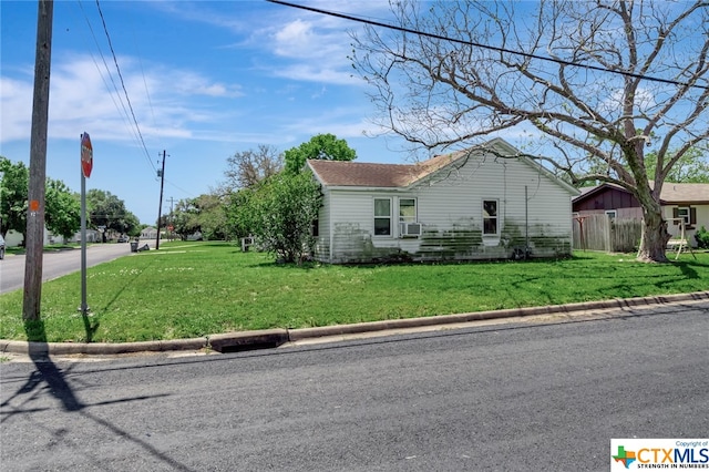 view of front of home with a front yard