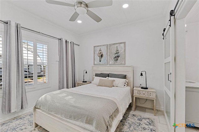 25 Augusta Cir, Aransas Pass, TX 78336 - bedroom with a barn door, ornamental molding, recessed lighting, and ceiling fan