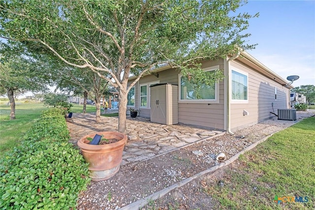 25 Augusta Cir, Aransas Pass, TX 78336 - rear view of house with a patio area and a yard