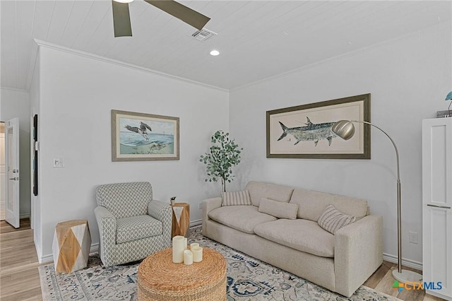 25 Augusta Cir, Aransas Pass, TX 78336 - living room with crown molding, light wood-type flooring, ceiling fan, and recessed lighting
