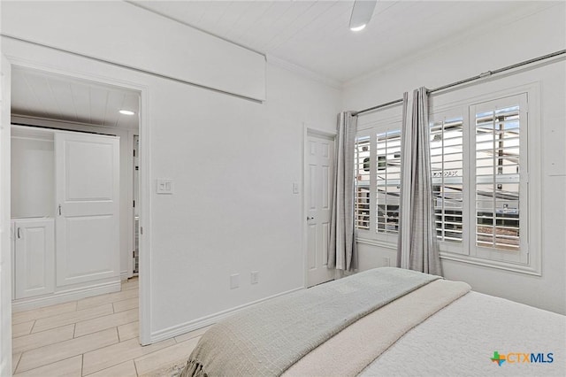 25 Augusta Cir, Aransas Pass, TX 78336 - bedroom featuring ornamental molding and light tile patterned flooring