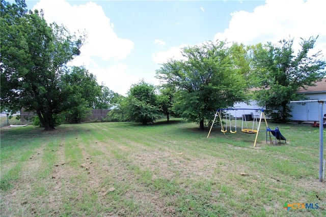 view of yard with a playground