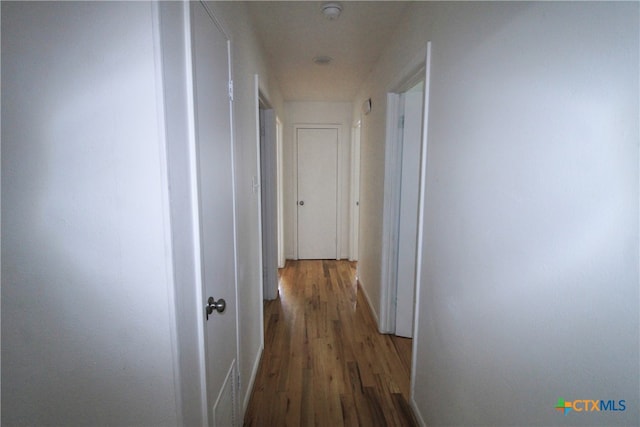 hall featuring hardwood / wood-style floors