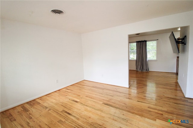 empty room featuring light hardwood / wood-style floors