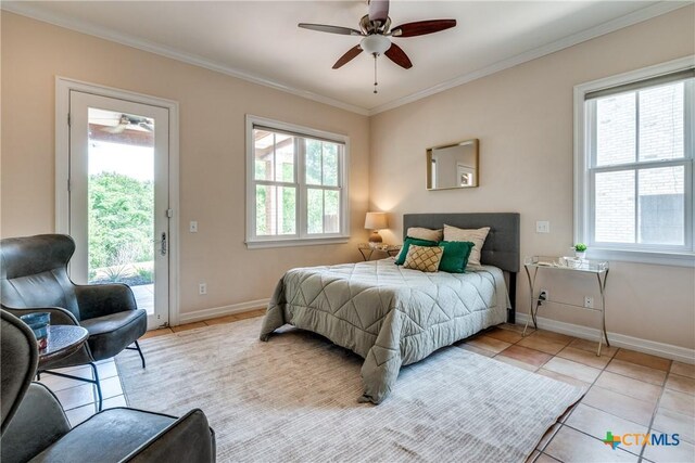 352 Ridge Crest Dr, Seguin, TX 78155 - bedroom featuring access to exterior, multiple windows, ornamental molding, baseboards, and light tile patterned flooring
