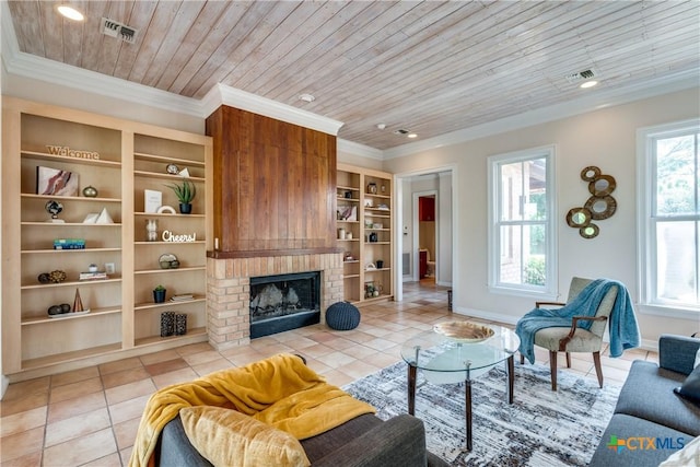 352 Ridge Crest Dr, Seguin, TX 78155 - living room with wooden ceiling, light tile patterned floors, built in features, a brick fireplace, and baseboards