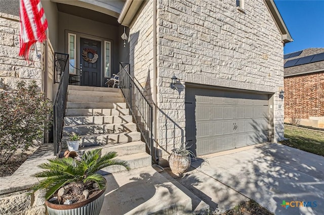 doorway to property featuring a garage