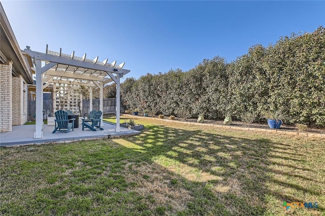 view of yard with fence, a patio area, and a pergola