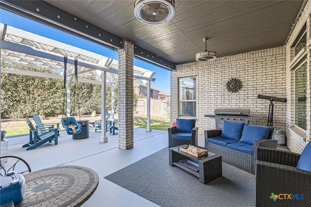 view of patio / terrace featuring an outdoor living space with a fire pit, fence, a pergola, and grilling area