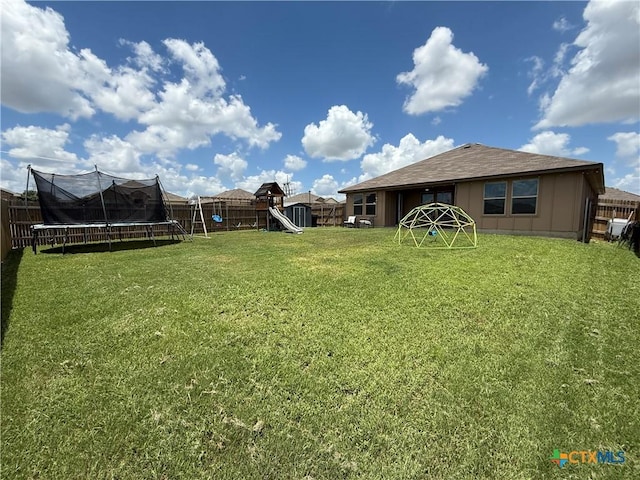 4002 Illian Cv, Killeen, TX 76542 - fenced backyard featuring a trampoline and a playground
