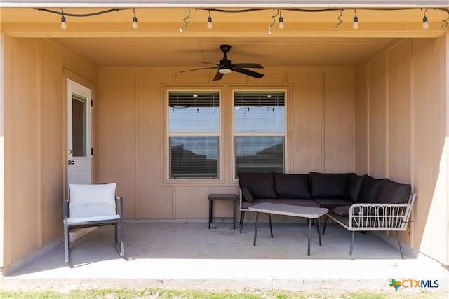 view of patio featuring an outdoor living space and ceiling fan