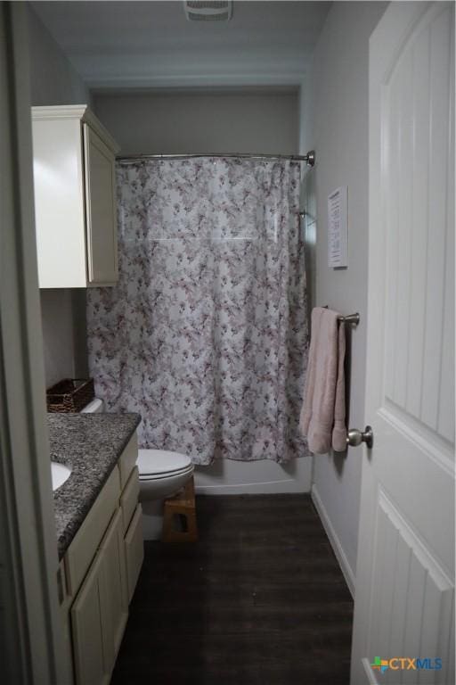 327 Limestone Crk, New Braunfels, TX 78130 - bathroom featuring vanity, wood finished floors, and a shower with shower curtain