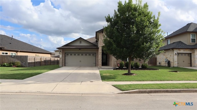 327 Limestone Crk, New Braunfels, TX 78130 - view of front facade with driveway, an attached garage, and brick siding