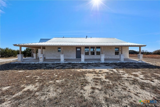 back of property featuring a patio area