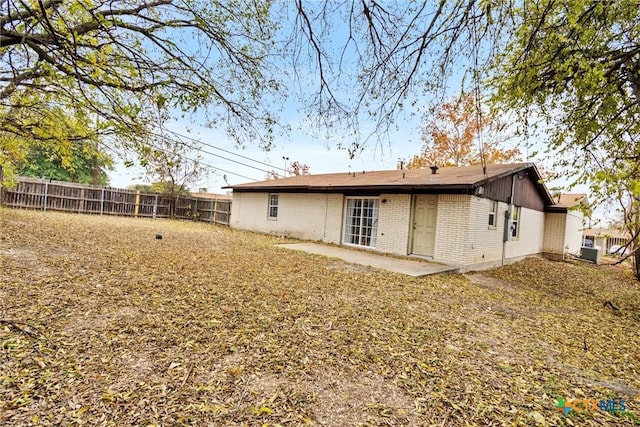 back of house featuring a patio area