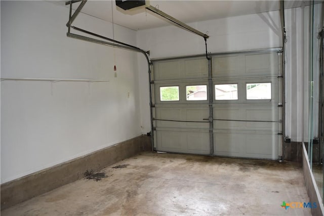 2007 Castle Gate Cir, San Marcos, TX 78666 - garage featuring a garage door opener