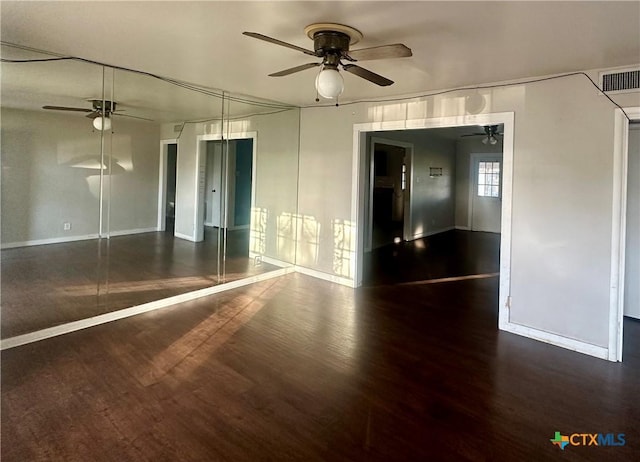 empty room featuring hardwood / wood-style flooring