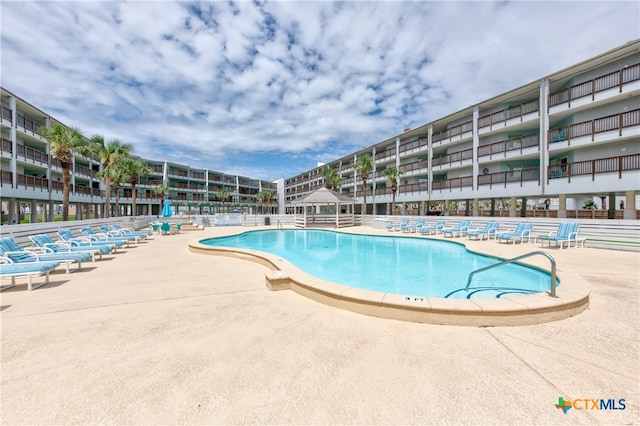 view of pool with a patio area